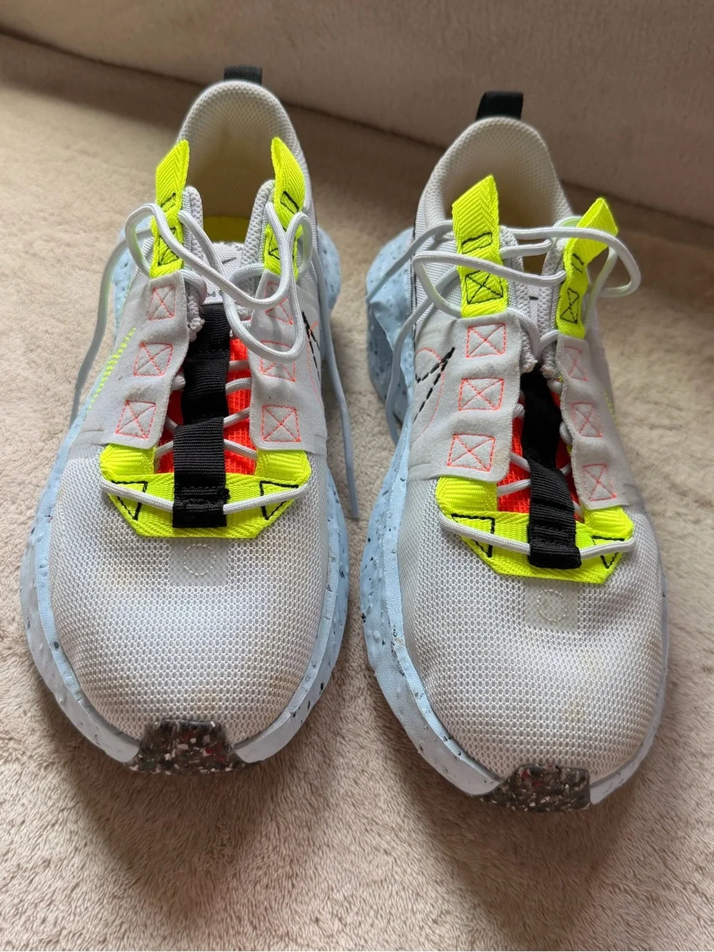 Nike Women’s White Athletic Shoes with Neon Yellow and Orange Accents